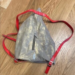 Aris Metallic Gold Backpack with Red Straps
